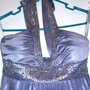 A silver gray sparkly dress